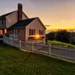 Beautiful colonial American house at sunset