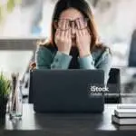 Concept Burnout Syndrome. Business Woman feels uncomfortable working. Which is caused by stress, accumulated from unsuccessful work And less resting body. Consult a specialist psychiatrist
