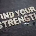 Find your strength, text words typography written with wooden letter on black background, life and business motivational inspirational concept